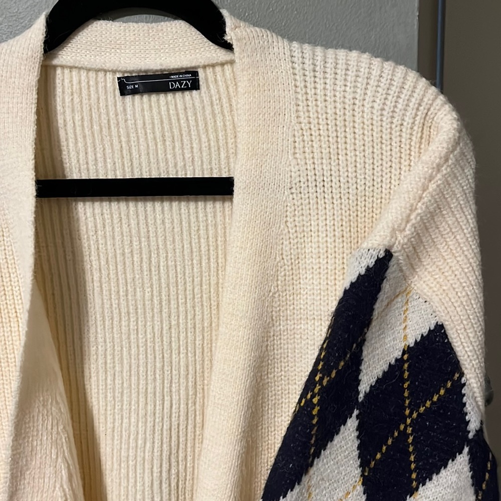 Cream cardigan with navy/yellow argyle sleeves